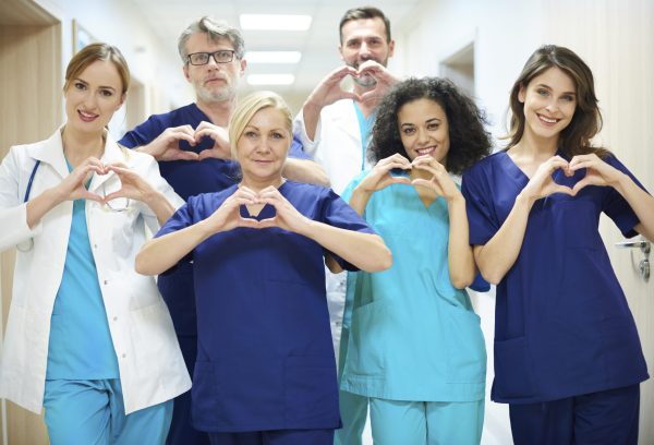 Group of doctors with heart symbol