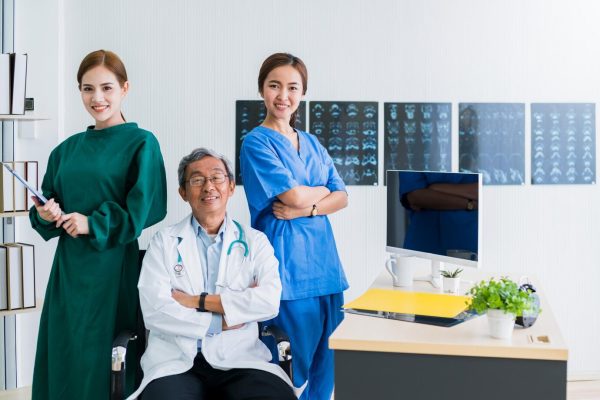 hospital-doctor-nurse-successful-teamwork-asian-expert-person-smile-with-happiness-confident-with-clinic-background_609648-2375
